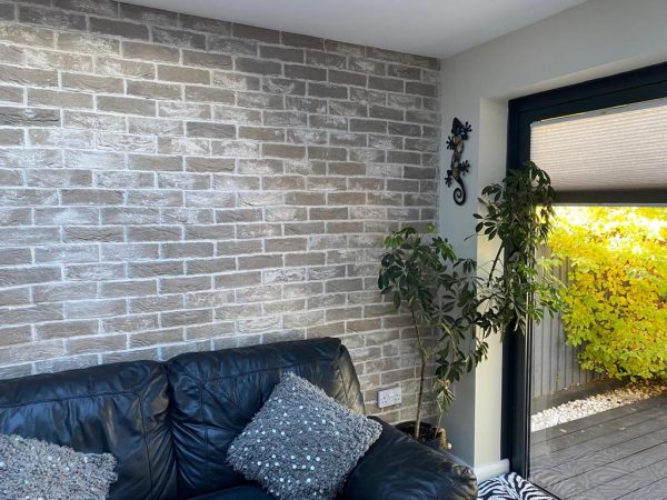 Dovecote Brick Slip Feature Wall with garden view