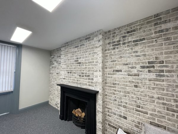 Brick Slips Office feature wall with grey brick slips - brick-tiles